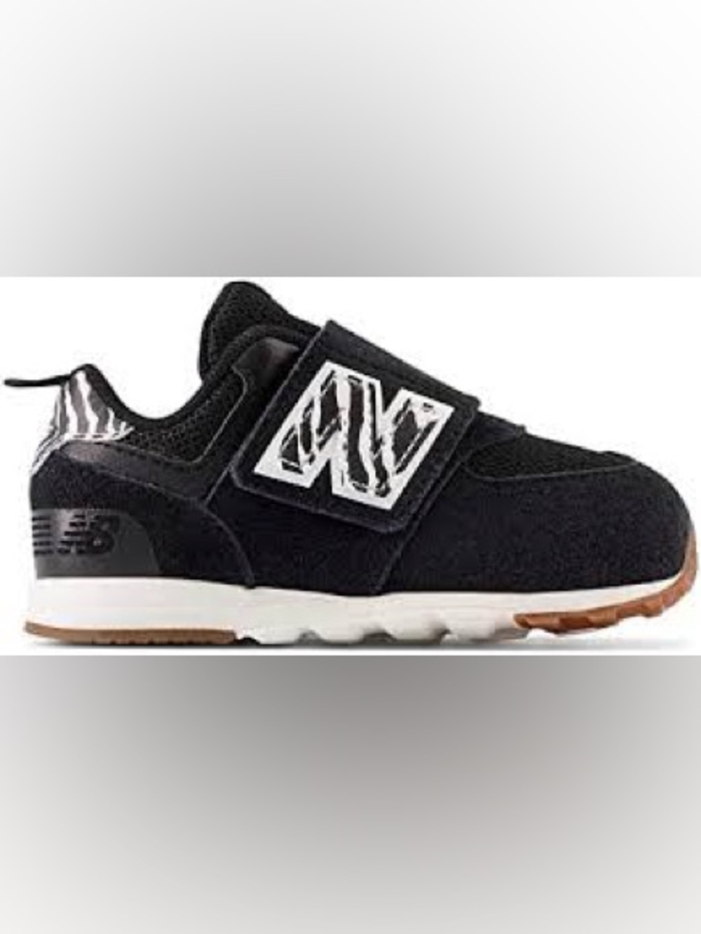 New Balance 574 New-b V1 toddler sneakers in a black zebra print colorway